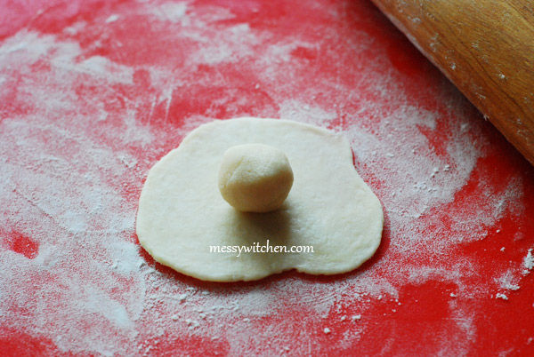 Place Oil Dough In The Center Of Water Dough